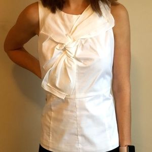 Crisp White Top with Architectural Bow Detail
